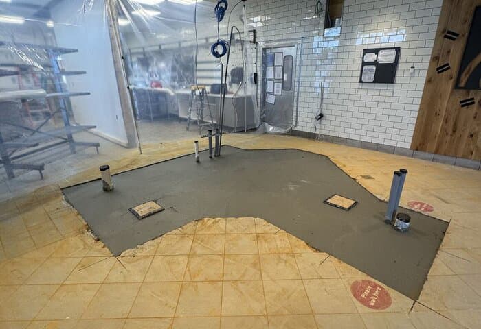 Active restaurant construction site mid-renovation